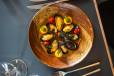 Saldanha Bay Mussels Steamed in a Malay Curry Cream,  Saffron Potatoes, Confit Tomato